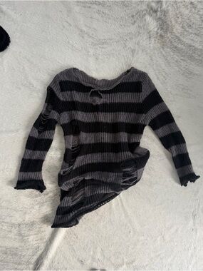 Distressed stripped knit sweater
